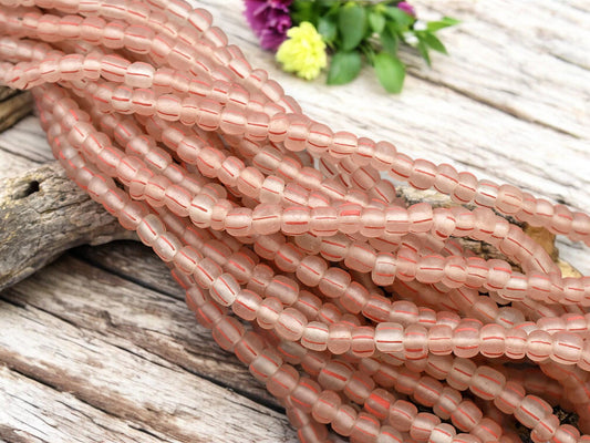 Striped Java Glass Beads. 4-7mm beads. Approx 24" Strands. 6-7 beads per inch.