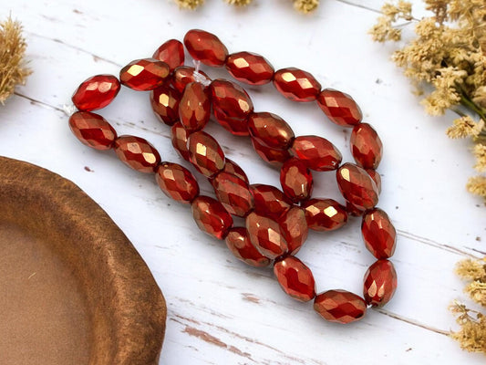 *12* 12x8mm Gold Lustered Ruby Red Fire Polished Faceted Oval Beads