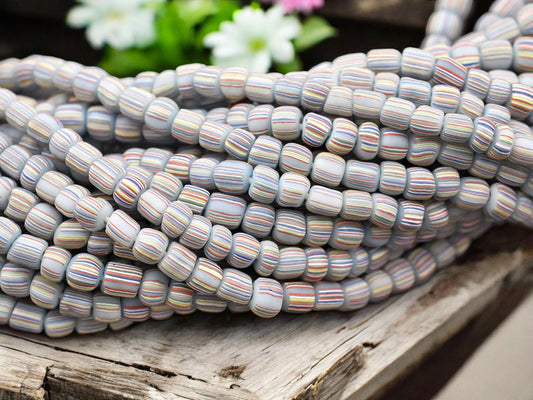 Striped Java Glass Beads. 4-7mm beads. Approx 24" Strands. 6-7 beads per inch.
