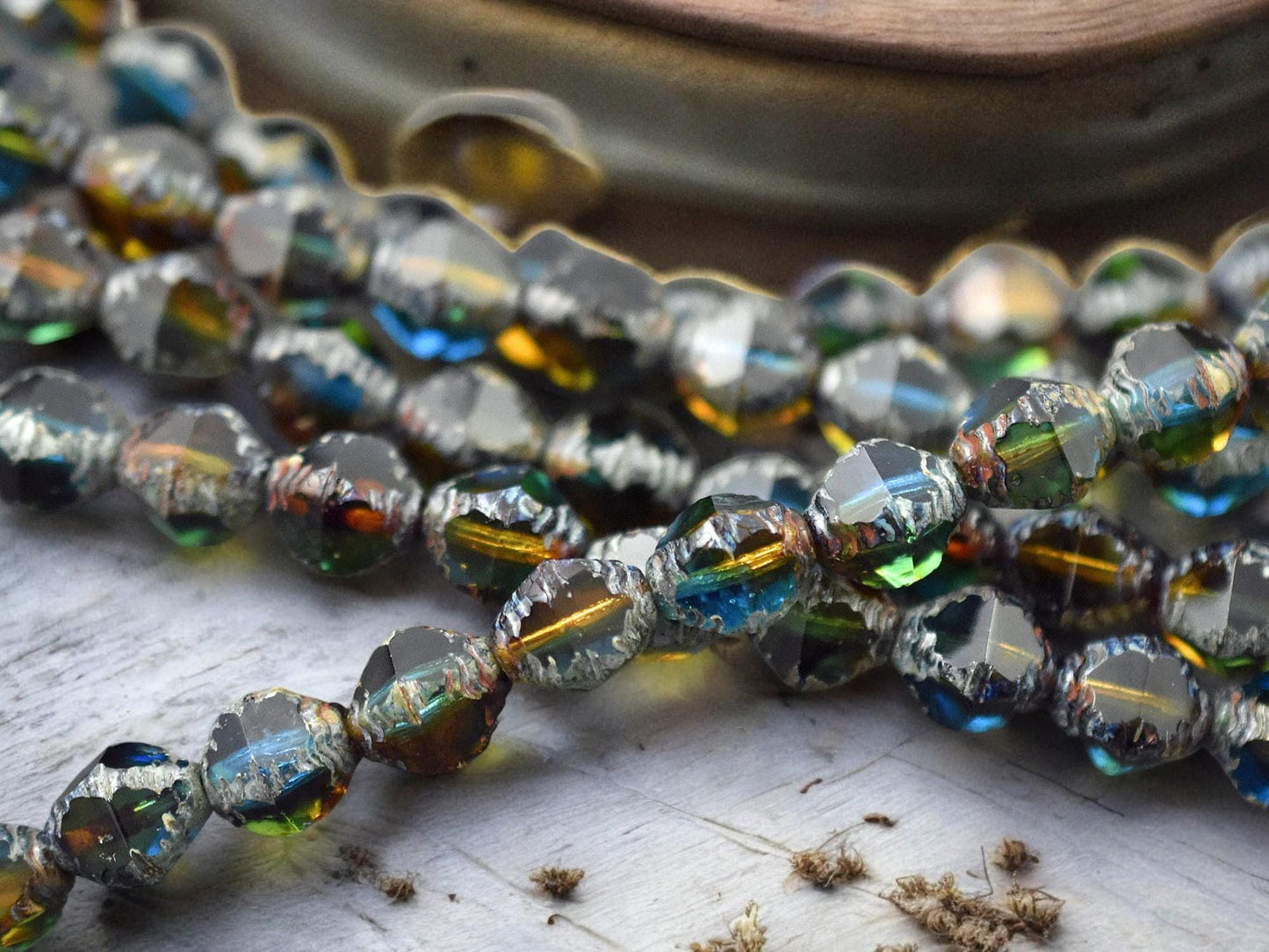 *15* 8x10mm Blended Teal Topaz Picasso Faceted Bicone Beads