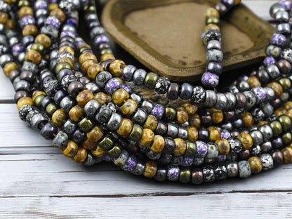 2/0 Aged Void Picasso Mix Seed Beads (21" Strand)