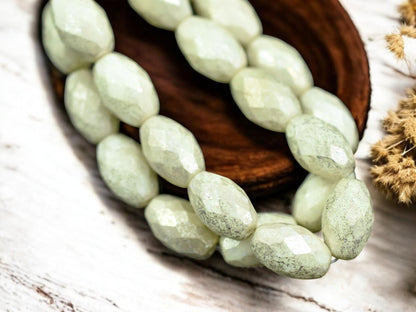 *12* 12x8mm Silver Merucry Washed Ivory Fire Polished Faceted Oval Beads