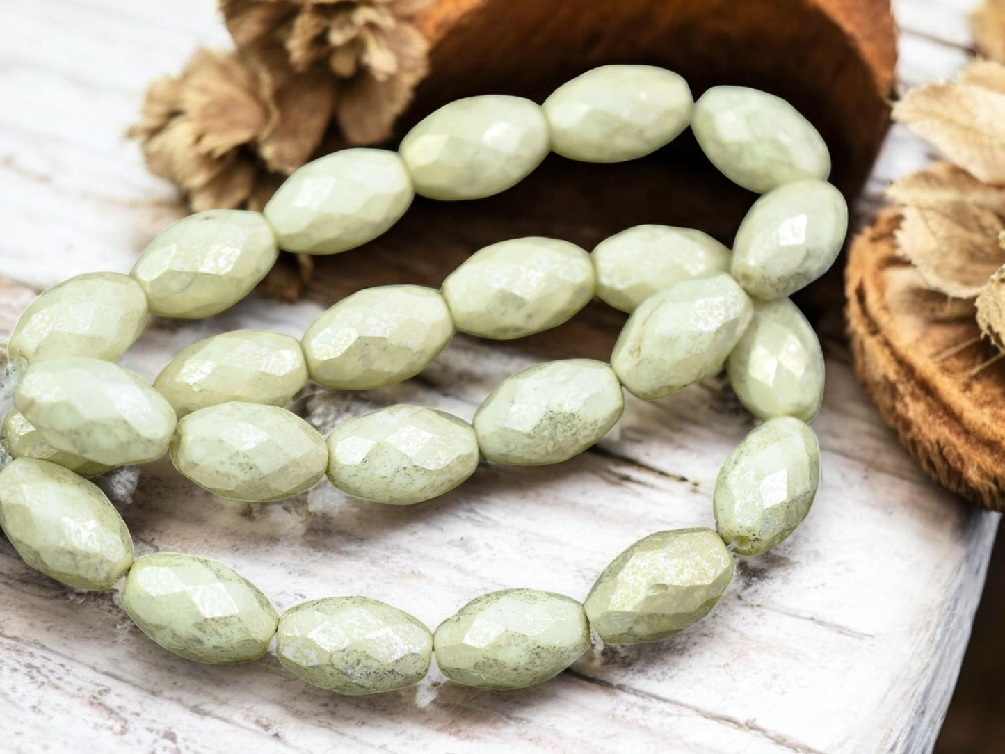 *12* 12x8mm Silver Merucry Washed Ivory Fire Polished Faceted Oval Beads