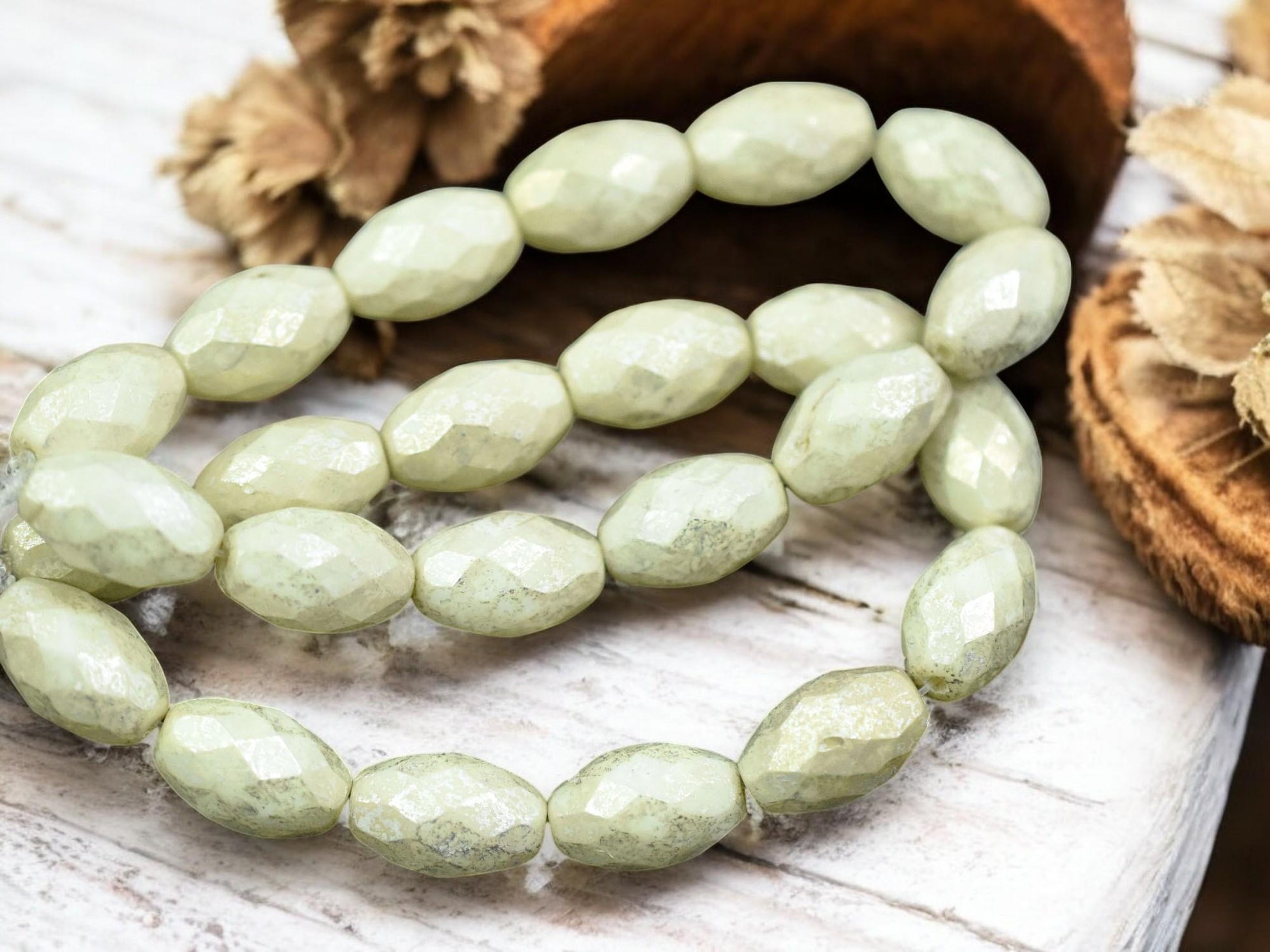 *12* 12x8mm Silver Merucry Washed Ivory Fire Polished Faceted Oval Beads