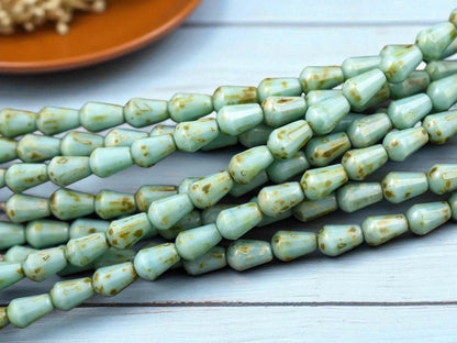 *19* 6x8mm Opaque Turquoise Picasso Vertical Teardrop Beads