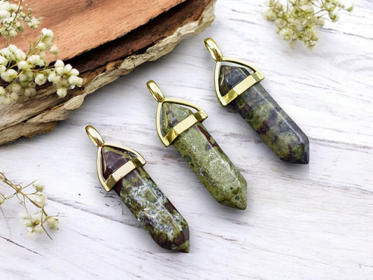 40mm Gold Tone Natural Dragon Blood Double Terminated Bullet Pendant