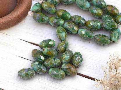 *12* 12x8mm Mottled Turquoise Picasso Fire Polished Faceted Oval Beads