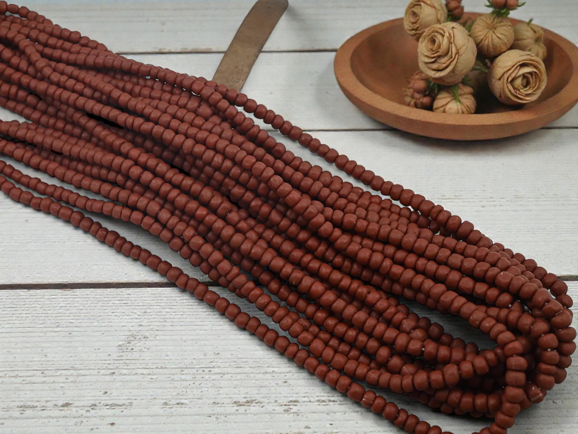 Oxblood Java Glass Beads. 4-7mm beads. Approx 24