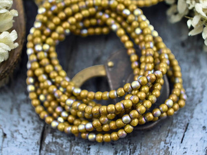 *50* 4mm Gold Lustered Dandelion AB Round Druk Beads