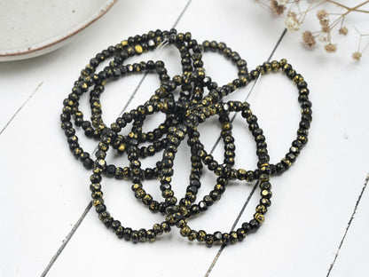 Czech Glass Trica Seed Bead Spacer Beads - Gold Splattered Jet Black - 4x3mm - 50pcs - (3854)
