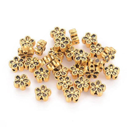 Antique Gold Metal Flower Spacer Beads - 7x4mm - 100pcs - (A555)