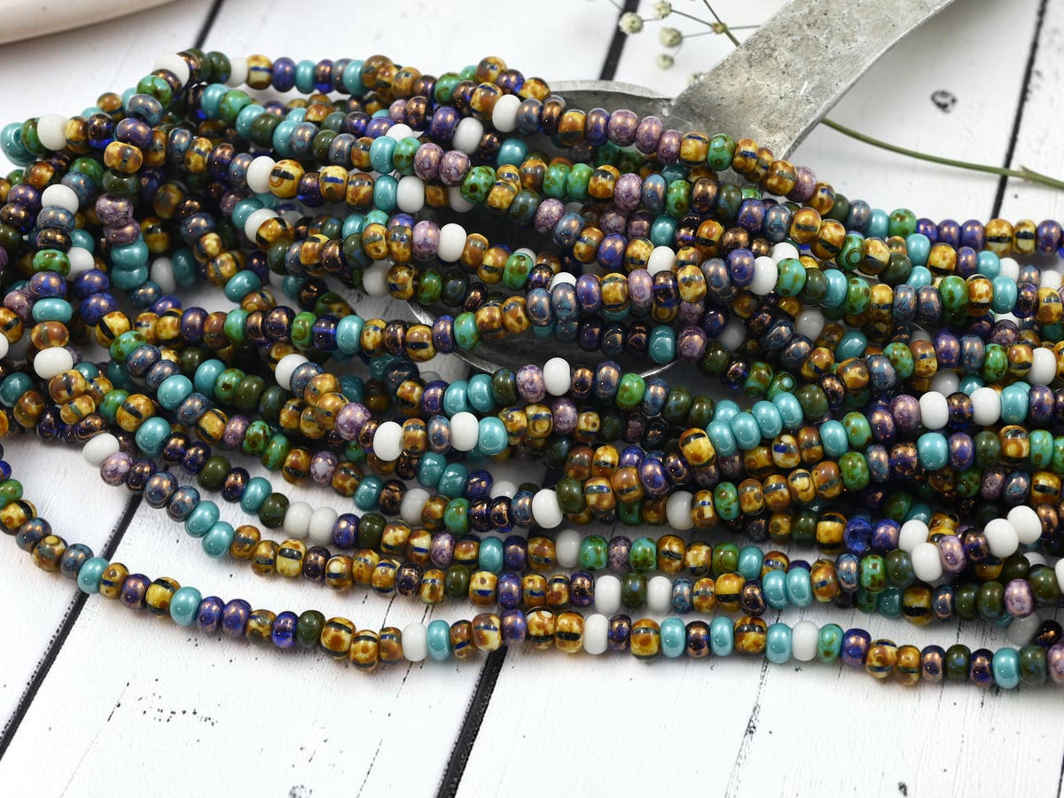 Size 6/0 Aged Picasso Seed Bead Strands - White Frost Striped Picasso Mix - 19" Strand - (B687)