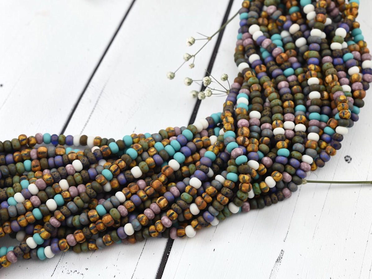 Size 6/0 Aged Picasso Seed Bead Strands - Matte White Frost Striped Picasso Mix - 19" Strand - (A132)