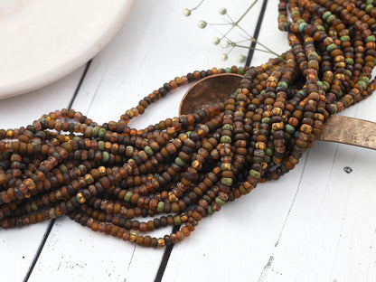 Size 6/0 Aged Matte Picasso Seed Bead Strands - Matte Druid Striped Picasso Mix - 20" Strand - (A412)