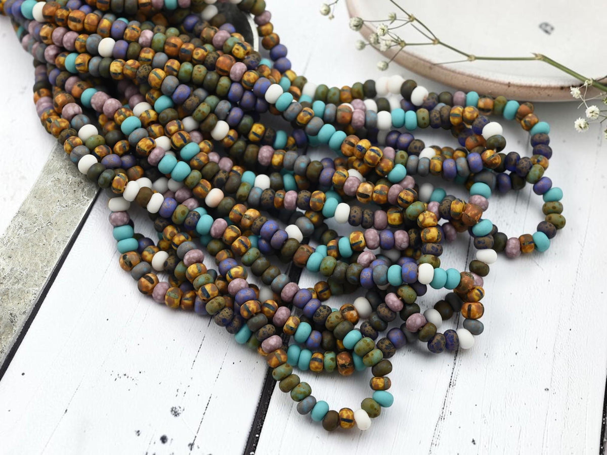 Size 6/0 Aged Picasso Seed Bead Strands - Matte White Frost Striped Picasso Mix - 19" Strand - (A132)