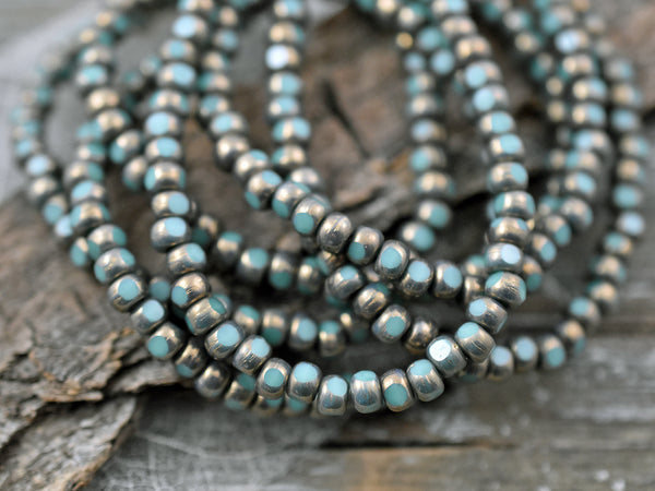 *50* 4x3mm Bronze Washed Turquoise Trica Beads