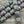 Load image into Gallery viewer, *4* 15x14mm Jet Green Iris Buddha Head Beads
