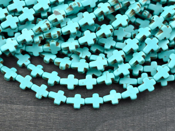 10x8x3mm Synthetic Turquoise Cross Beads 15" Strand