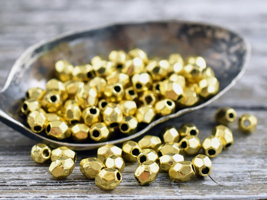 *300* 4x3mm Gold Faceted Oval Spacer Beads