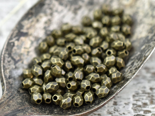 *250* 4x3mm Antique Bronze Faceted Oval Spacer Beads