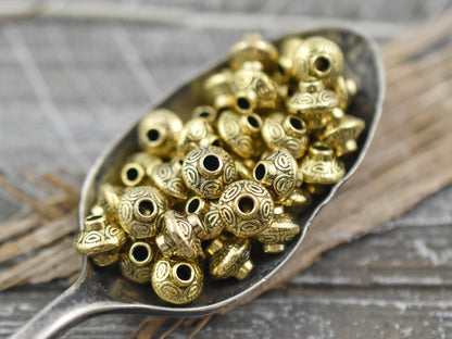 *100* 6mm Antique Gold Bicone Spacer Beads