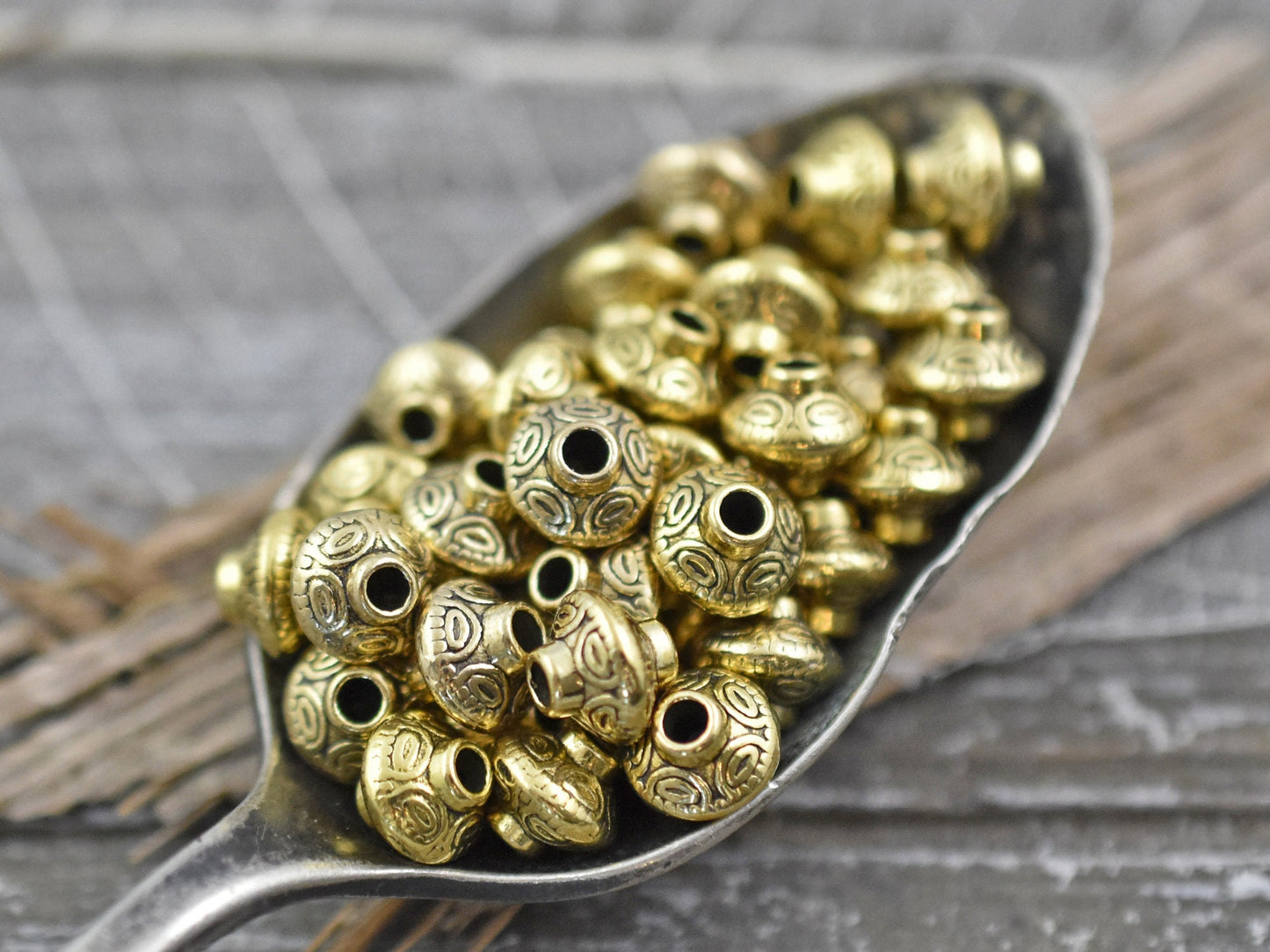 *100* 6mm Antique Gold Bicone Spacer Beads