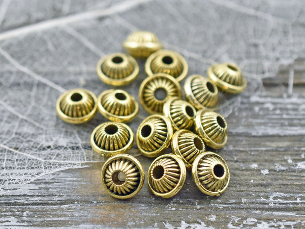 *25* 5x7mm Antique Gold Bicone Spacer Beads